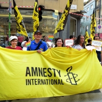 Foto Nicoloro G.   27/06/2015  Milano    Dodicesima edizione del " Milano Gay Pride " che con lo slogan " I diritti nutrono il pianeta " ha visto sfilare in corteo 100.000 partecipanti. nella foto uno striscione lungo il corteo.