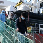 Foto Nicoloro G.   21/03/2024   Porto Corsini - Ravenna   Ha attraccato al terminal di Porto Corsini la nave Ong ' Life Support ' di Emergwncy con a bordo 71 migranti, 70 uomini, dei quali 3 minori, e 1 donna.  In particolare 61 vengono dal Bangladesh, 9 dall' Eritrea e 1 dall' Egitto. nella foto un momento dello sbarco dei migranti.