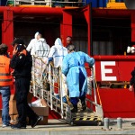 Foto Nicoloro G.   15/10/2024   Ravenna   E\' approdata nel porto di Ravenna la nave ong Ocean Viking con a bordo 47 migranti dei quali 33 sono uomini, 4 donne e 10 minori dei quali 7 non accompagnati. In particolare 18 provengono dall\' Egitto, 3 dal Pakistan, 13 dalla Siria e 13 dal Bangladesh. Una volta compiuti i controlli di rito tutti i migranti resteranno in Emilia-Romagna e ripartiti tra diverse citta\' della regione. nella foto medici ed infermieri salgono a bordo per un primo controllo sanitario.