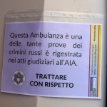 Foto Nicoloro G.   14/07/2024   Ravenna   Esposta in piazza a Ravenna l\' autoambulanza mitragliata dai russi a Kharkiv. nella foto un cartello presente sull\'ambulanza mitragliata.