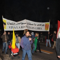 Foto Nicoloro G. 04/03/2011 Milano Manifestazione in piazza Loreto con corteo di un centinaio di immigrati libici contro il regime di Gheddafi a cui hanno partecipato anche immigrati tunisini ed egiziani. nella foto Manifestanti con un grande striscione