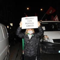 Foto Nicoloro G. 04/03/2011 Milano Manifestazione in piazza Loreto con corteo di un centinaio di immigrati libici contro il regime di Gheddafi a cui hanno partecipato anche immigrati tunisini ed egiziani. nella foto Manifestante con cartello