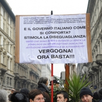 Foto Nicoloro G. 13/02/2011 Milano Manifestazione delle donne " Se non ora quando ? " per la dignita' del soggetto donna e contro Berlusconi. nella foto Manifestanti con cartello di protesta