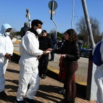 Foto Nicoloro G.   02/03/2025   Ravenna   E' approdata nel porto di Ravenna la nave ong Humanity 1 con a bordo 71 migranti quasi tutti provenienti dall' Eritrea e dall' Etiopia. nella foto dei volontari distribuiscono ai migranti una cartolina con tutti i numeri di telefono da contattare in caso di emergenza.