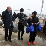 Foto Nicoloro G.   17/12/2024   Ravenna   E' approdata nel porto di Marina di Ravenna la nave Ocean Viking della ong Sos Mediterranee con a bordo 163 naufraghi. Di questi 100 sono uomini adulti , 9 donne delle quali una e' incinta e un' altra con un neonato, 21 sono minori non accompagnati e 33 minori di altrettanti nuclei famigliari..  I paesi di provenienza sono Afghanistan, Siria, Iran, Gambia ma anche Uzbekistan e Pakistan. nella foto anche il prefetto Raffaele Ricciardi si adopera per aiutare i migranti a sbarcare.