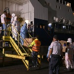 Foto Nicoloro G.   08/08/2024   Ravenna   E\' approdata in piena notte la nave ong Geo Barents di Medici Senza Frontiere con a bordo 73 migranti tra cui tre minori non accompagnati. nella foto alcuni medici ed infermieri salgono a bordo per un primo controllo sanitario.