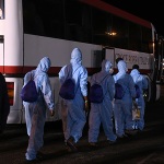 Foto Nicoloro G.   08/08/2024   Ravenna   E\' approdata in piena notte la nave ong Geo Barents di Medici Senza Frontiere con a bordo 73 migranti tra cui tre minori non accompagnati. nella foto i migranti con un autobus della Croce Rossa vengono portati in una struttura per gli accertamenti di Polizia e controlli sanitari accurati.