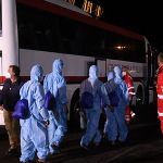 Foto Nicoloro G.   08/08/2024   Ravenna   E\' approdata in piena notte la nave ong Geo Barents di Medici Senza Frontiere con a bordo 73 migranti tra cui tre minori non accompagnati. nella foto i migranti con un autobus della Croce Rossa vengono portati in una struttura per gli accertamenti di Polizia e controlli sanitari accurati.