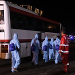 Foto Nicoloro G.   08/08/2024   Ravenna   E\' approdata in piena notte la nave ong Geo Barents di Medici Senza Frontiere con a bordo 73 migranti tra cui tre minori non accompagnati. nella foto i migranti con un autobus della Croce Rossa vengono portati in una struttura per gli accertamenti di Polizia e controlli sanitari accurati.