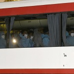 Foto Nicoloro G.   08/08/2024   Ravenna   E\' approdata in piena notte la nave ong Geo Barents di Medici Senza Frontiere con a bordo 73 migranti tra cui tre minori non accompagnati. nella foto i migranti con un autobus della Croce Rossa vengono trasportati in una struttura per gli accertamenti di polizia e le visite mediche accurate.